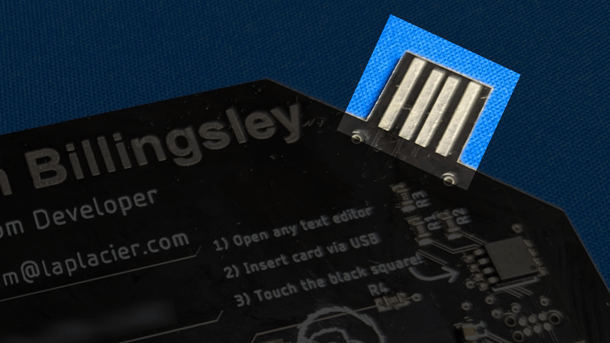 Closeup of business card v1 where USB connector is located Business Card v1 USB