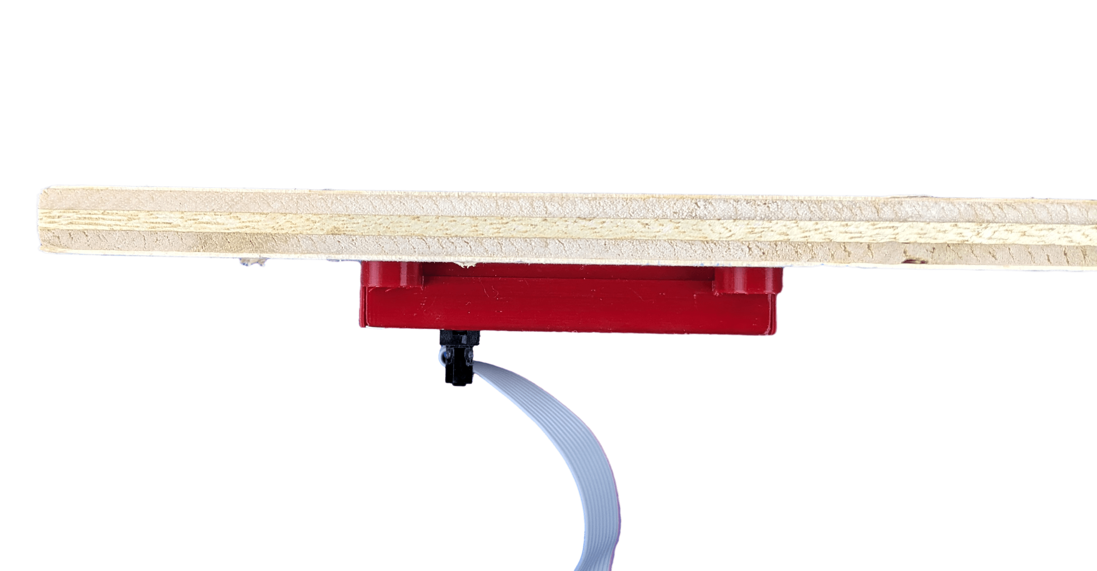 A picture of the EZ RFID module mounted to a 1/2 inch piece of plywood RFID Mounted