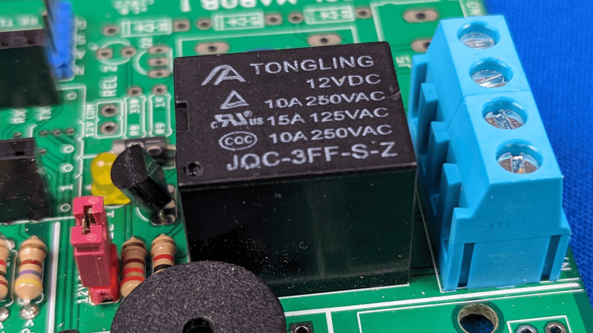 A picture of a relay module mounted on a pcb Relay Module